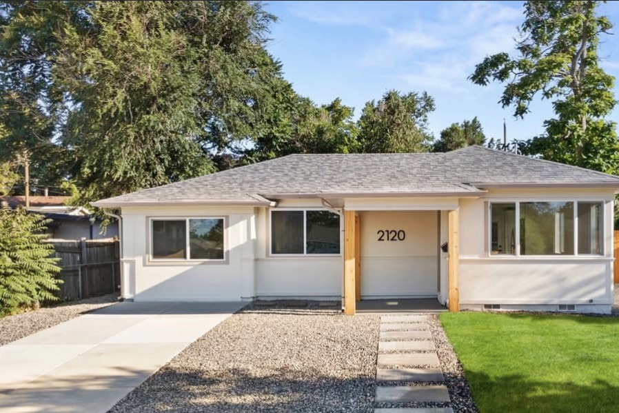 Front exterior of a remodeled Denver ranch home with new landscaping