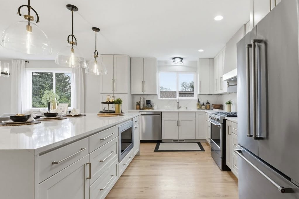 Kitchen with pendant lights and a French-door fridge